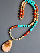 Peach Moonstone, Carnelian & Blue Quartz ft. Fossilized Coral Pendant