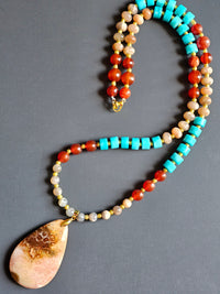 Peach Moonstone, Carnelian & Blue Quartz ft. Fossilized Coral Pendant