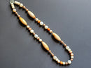 Matte Spiderweb Jasper, Ivory Howlite, & Sunstone ft. Peach Druzy & Rose Gold-toned Lava Rock