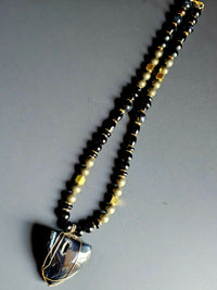 Onyx, Banded Agate, & Falcon's Eye ft. Pyrite & Copper-wrapped Onyx Pendant
