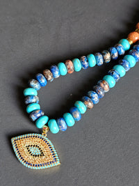 Rhyolite, Blue Howlite, Goldstone & Gold Hematite ft. Nazar Pendant