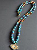 Rhyolite, Blue Howlite, Goldstone & Gold Hematite ft. Nazar Pendant