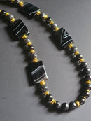 Matte Onyx & Grey Reconstructed Shell ft. Black Agate & Gold Hematite