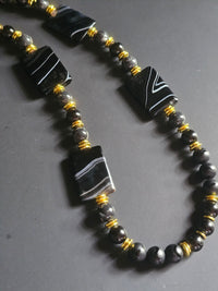 Matte Onyx & Grey Reconstructed Shell ft. Black Agate & Gold Hematite