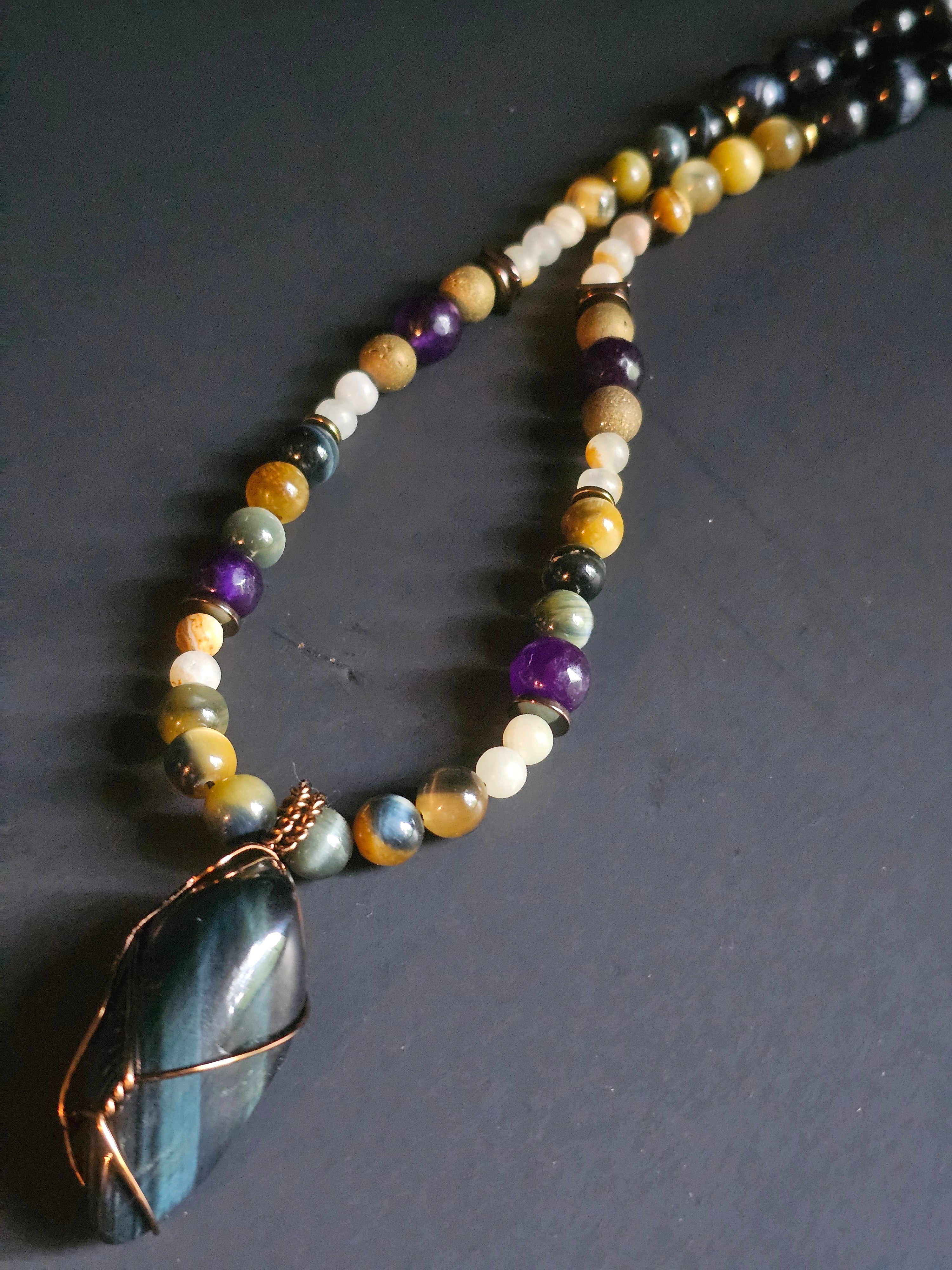 Blue Tigers Eye ft. Amazonite, Purple Jade, Falcon's Eye, & Blue Copper-wrapped Pendant
