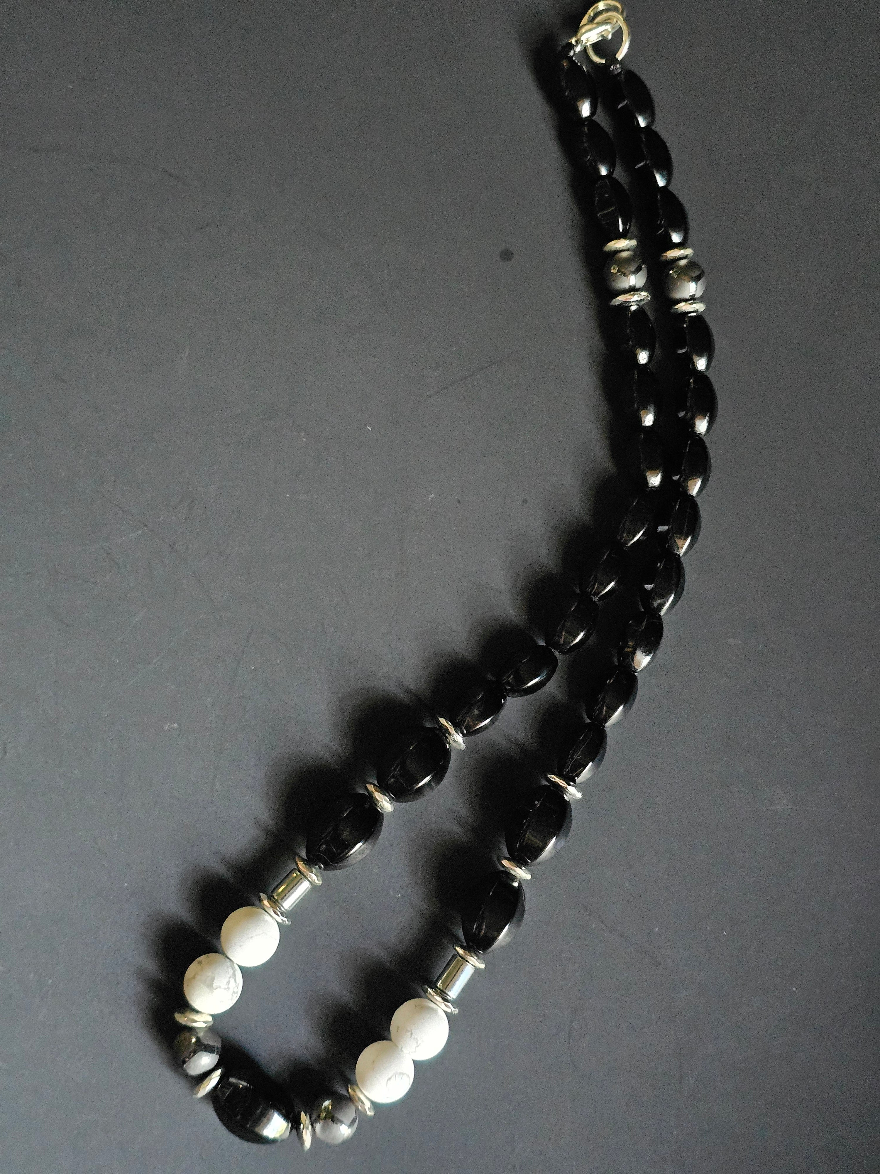 Faceted Onyx ft. White Howlite & Striped Silver Hematite