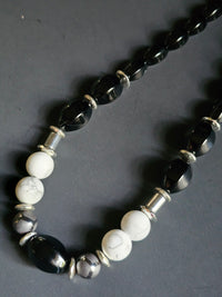 Faceted Onyx ft. White Howlite & Striped Silver Hematite