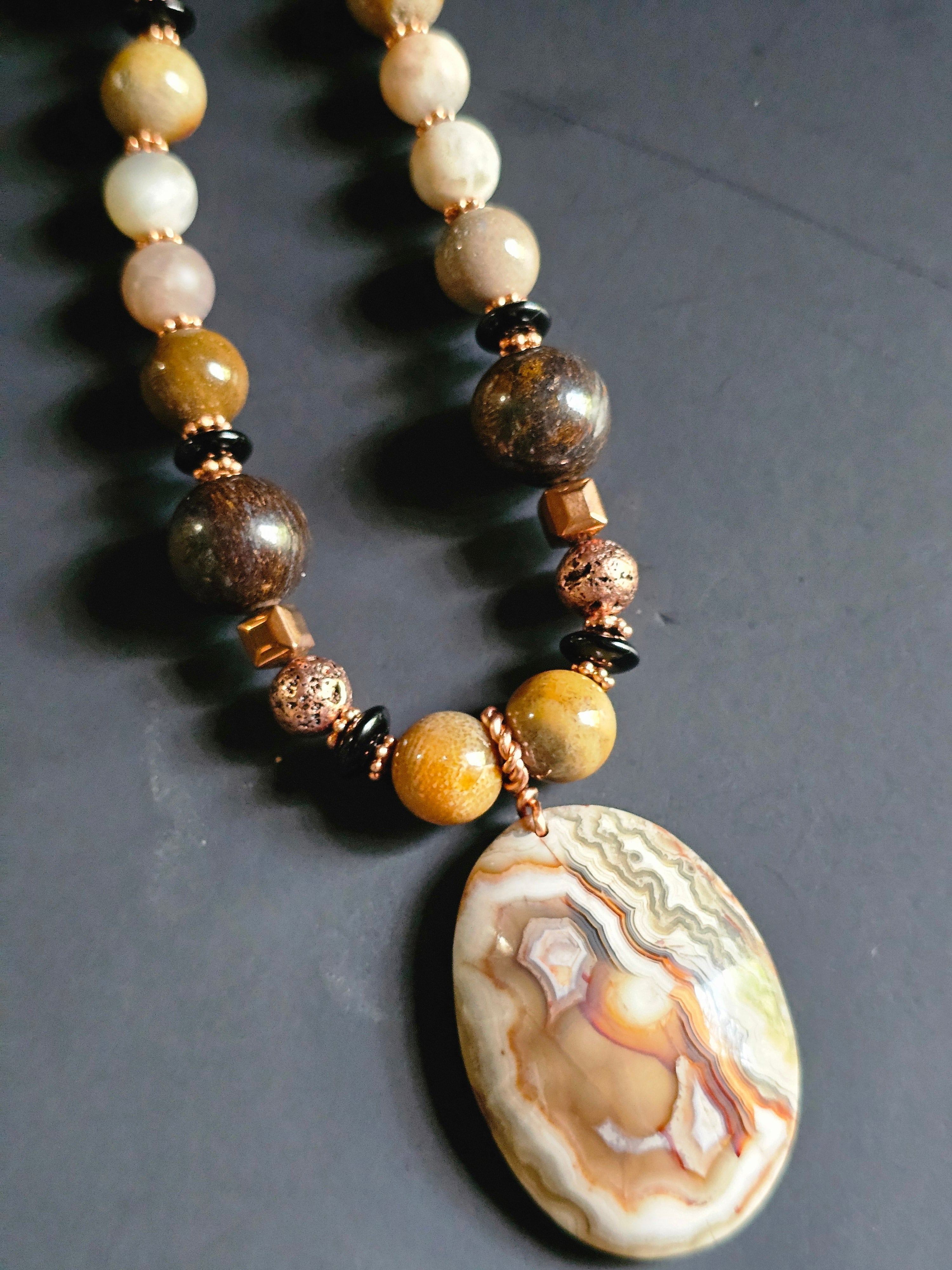 Bronzite & Matte Sunstone ft. Fossilized Coral, Copper-plated Lava Rock, & Copper-tone Hematite Cubes