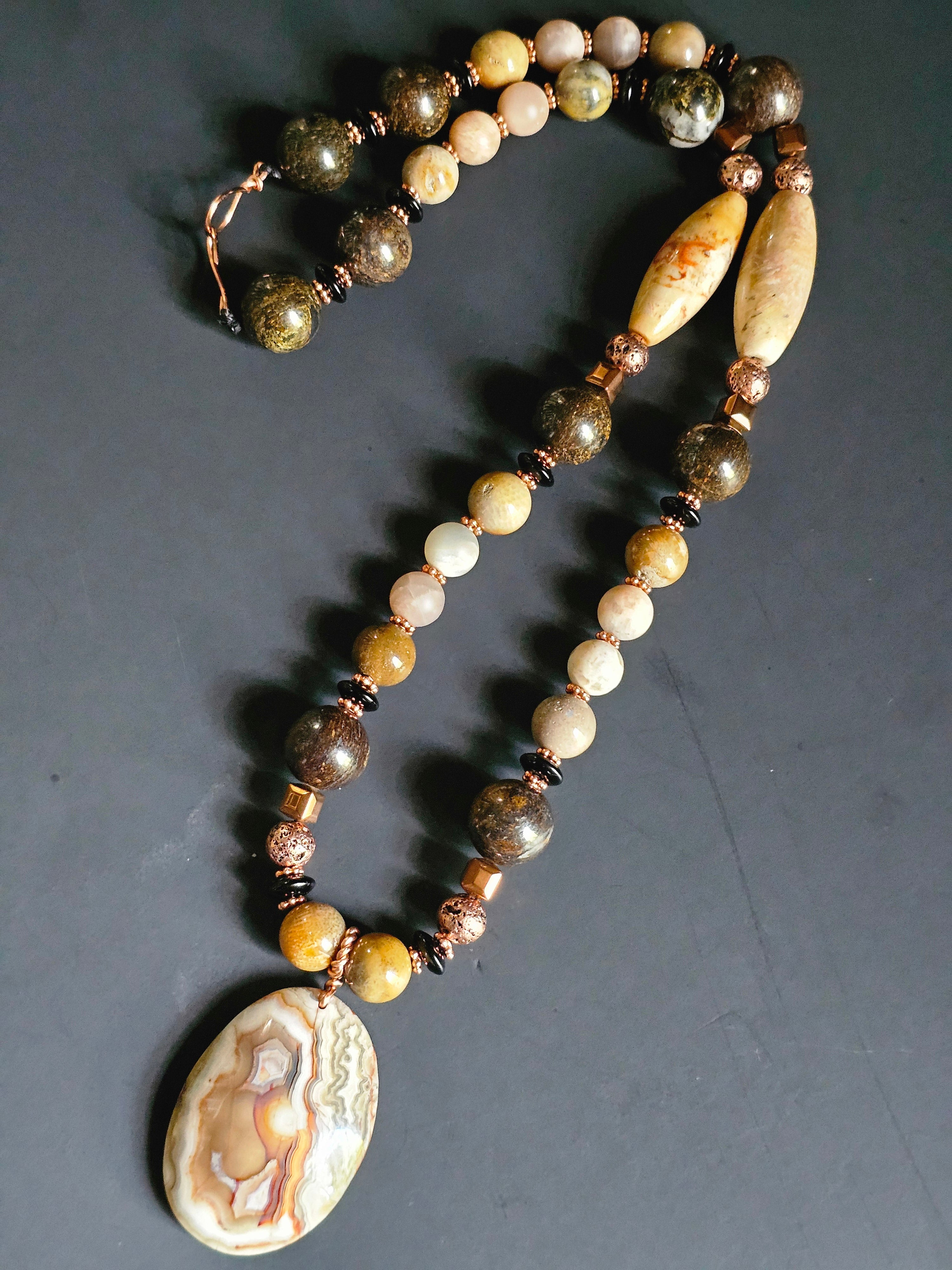 Bronzite & Matte Sunstone ft. Fossilized Coral, Copper-plated Lava Rock, & Copper-tone Hematite Cubes